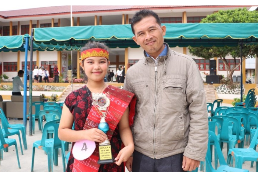 Siska Putri Simanjuntak (kiri).(foto/istimewa)