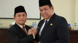 Charles Bantjin (kiri) bersama BUpati Dairi, Eddy Berutu.(foto/istimewa)