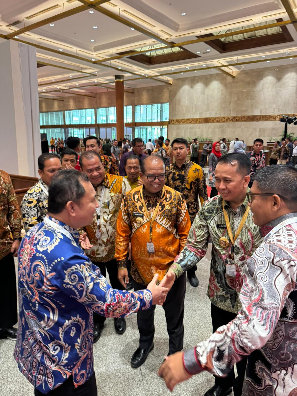 Pj Bupati Dairi saat menghadiri LHP oleh BPK di JCC Jakarta. (foto/ist)