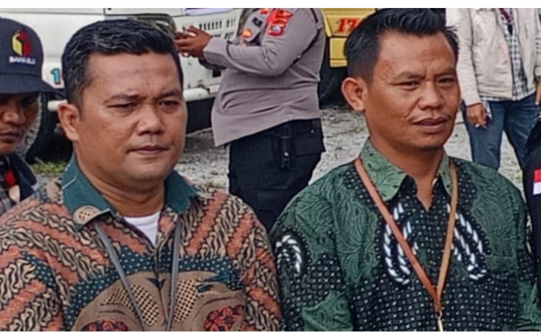 Komisioner KPU Dairi, Asih Firmansyah Solin dan Ridwan Hendra Agustinus Samosir.(Ist)